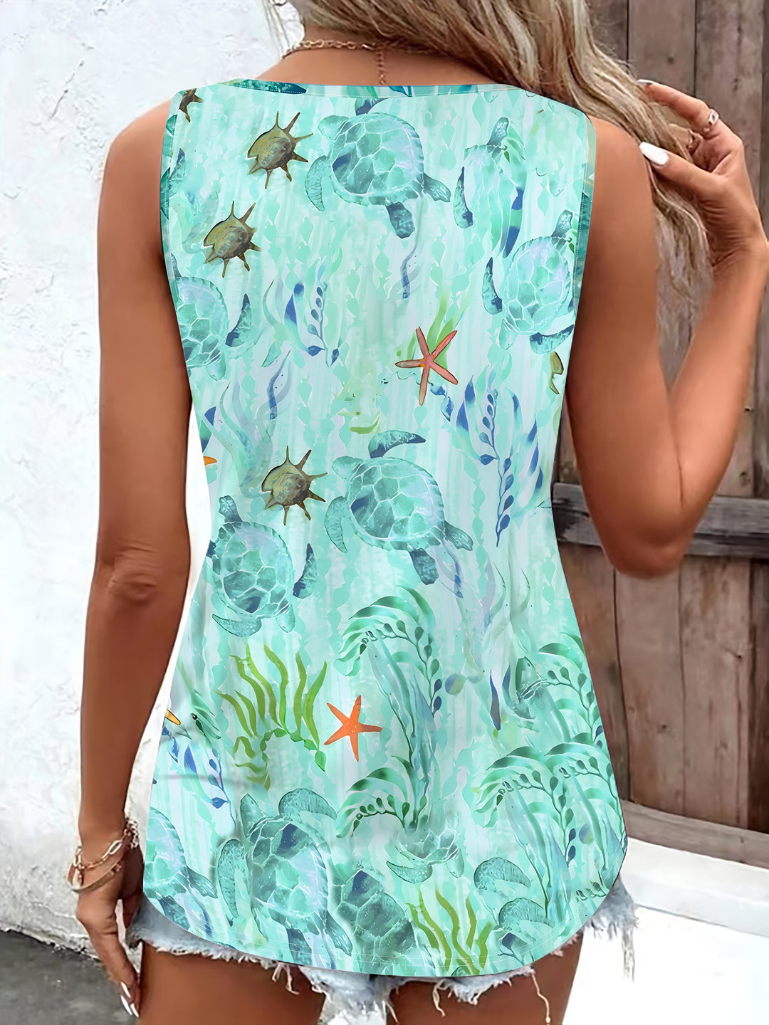 Taryelle | V‑Neck Top mit Turtle‑Print